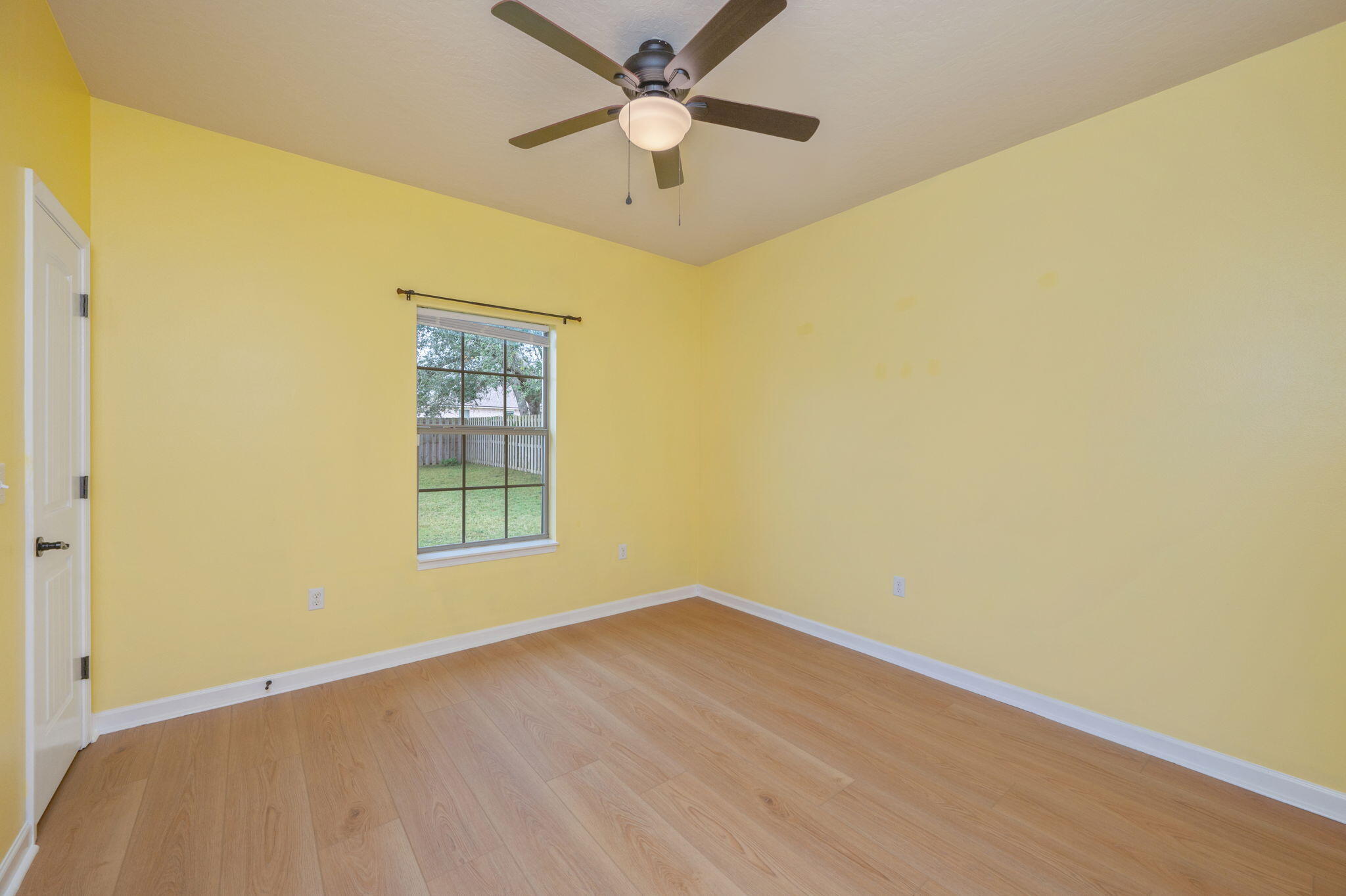 5275 Moore Loop Crestview, FL 32536 - Photo 20 of 32 a view of an empty room with a window