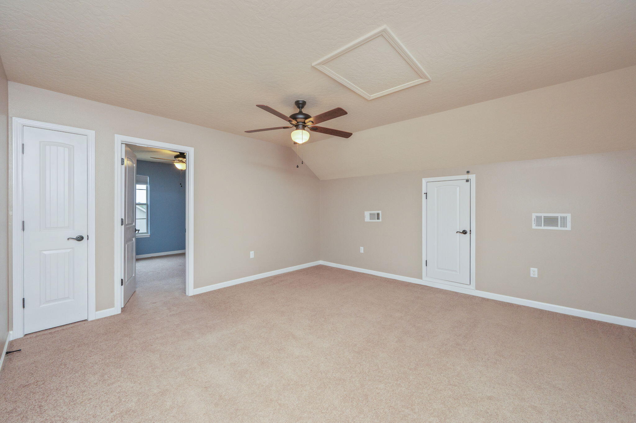 5275 Moore Loop Crestview, FL 32536 - Photo 23 of 32 a view of an empty room with a ceiling fan