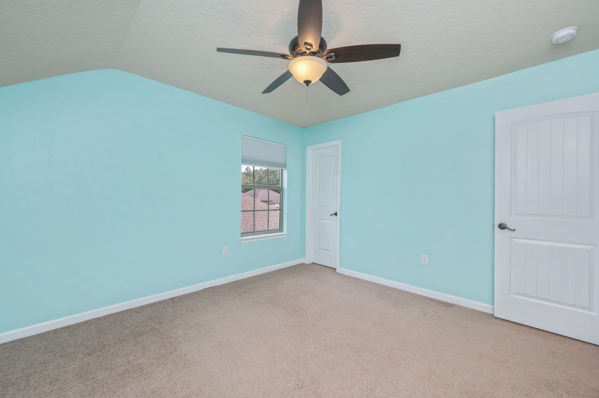 5275 Moore Loop Crestview, FL 32536 - Photo 24 of 32 an empty room with a window and a fan