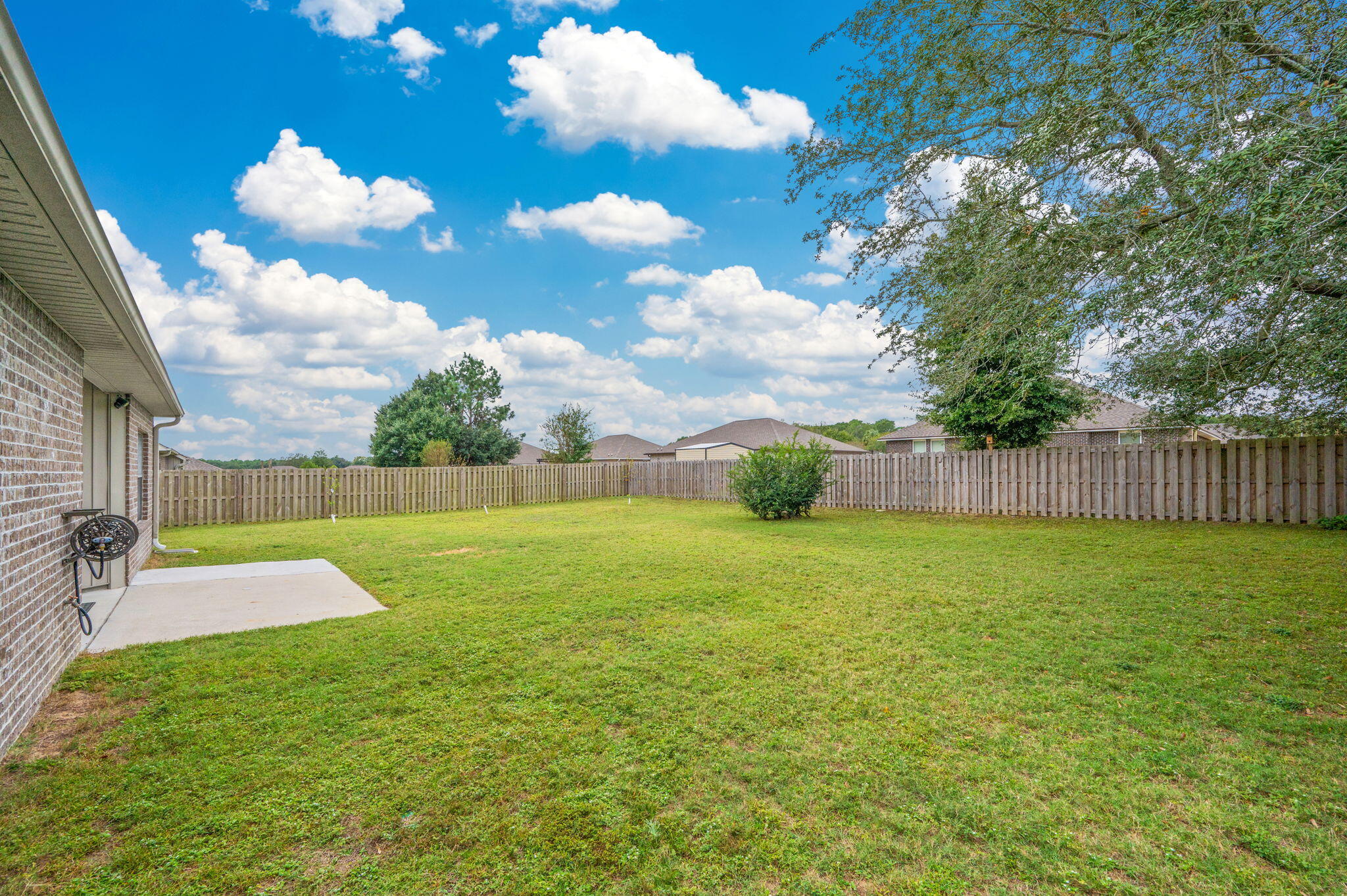5275 Moore Loop Crestview, FL 32536 - Photo 31 of 32 a view of a playground with basketball court