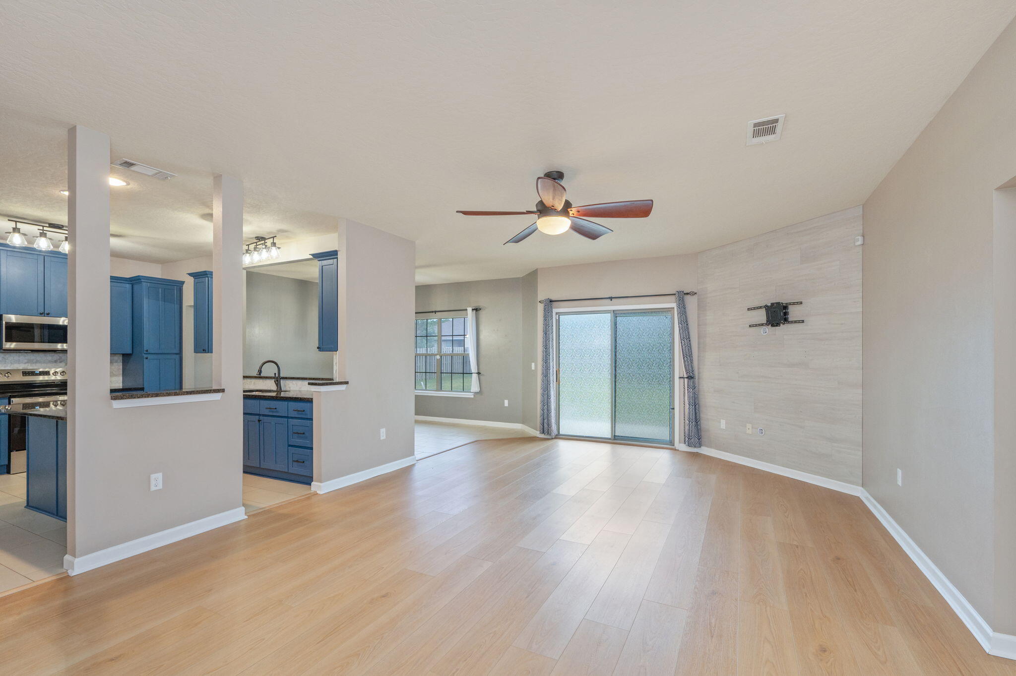 5275 Moore Loop Crestview, FL 32536 - Photo 9 of 32 a view of a kitchen with a sink and a refrigerator