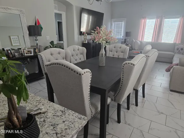 a view of a dining room with furniture