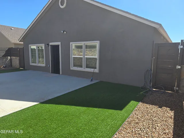 a view of a field with an outdoor space