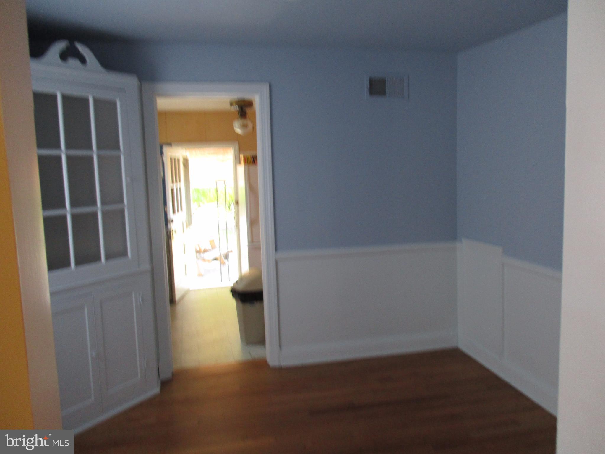 3507 Rolling Rd. Baltimore, MD 21244 - Photo 7 of 8 an empty room with windows