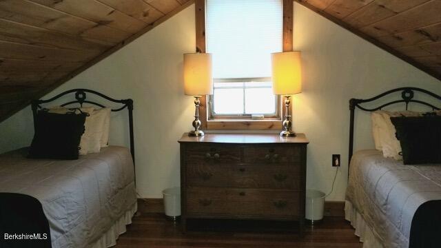 257 North Main Street Hancock, MA 01237 - Photo 8 of 13 a bedroom with a bed and wooden floor