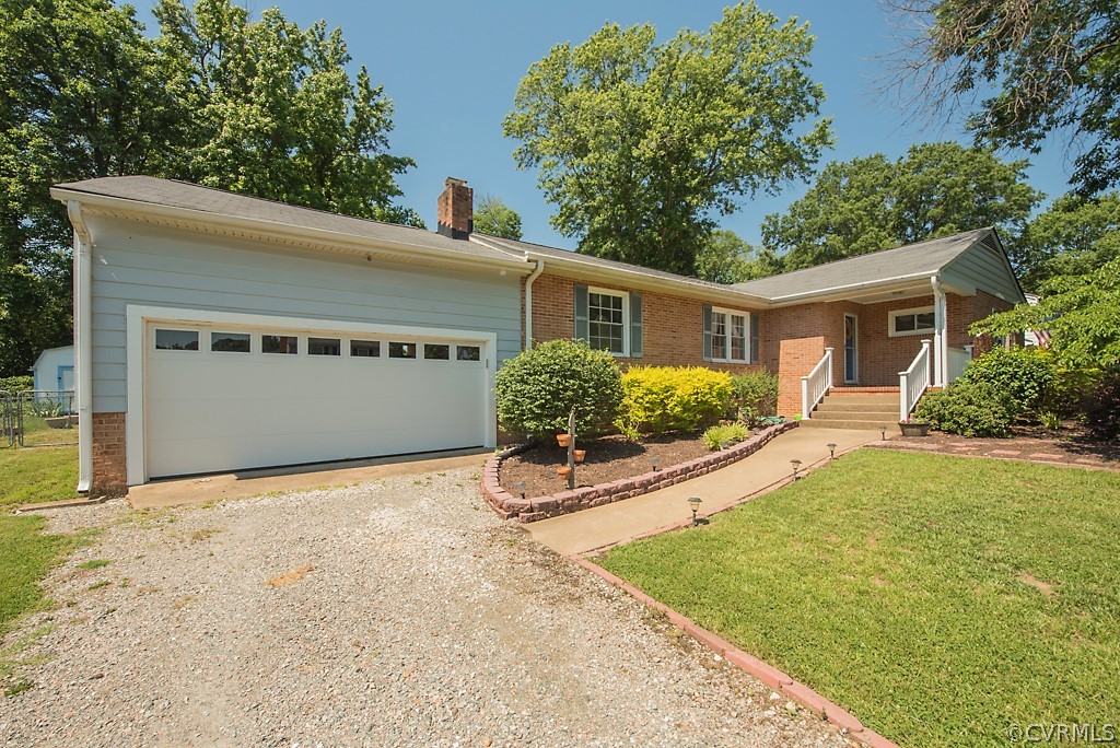 3825 Frankmont Road Richmond, VA 23234 - Photo 1 of 47 a view of a house with backyard and a tree