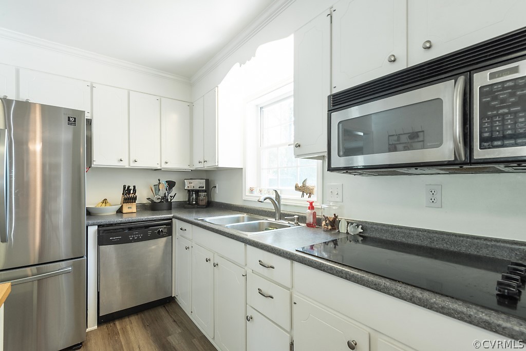 3825 Frankmont Road Richmond, VA 23234 - Photo 20 of 47 a kitchen with stainless steel appliances granite countertop white cabinets sink and refrigerator