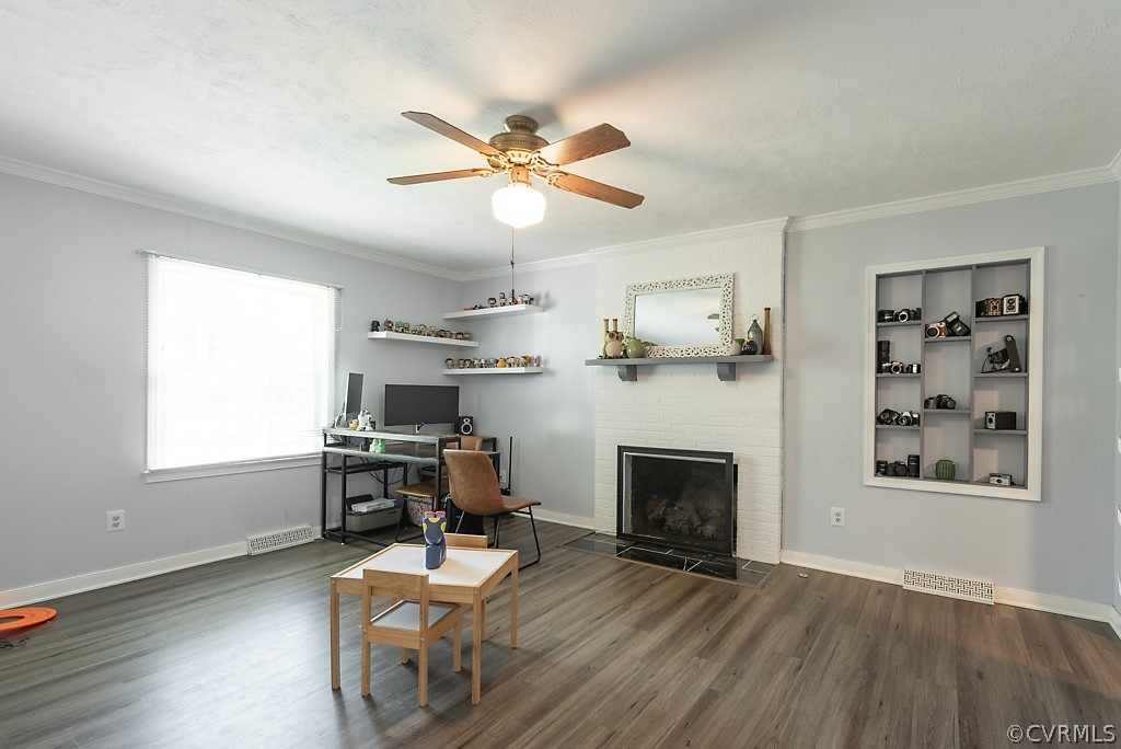 3825 Frankmont Road Richmond, VA 23234 - Photo 21 of 47 a living room with furniture and a fireplace