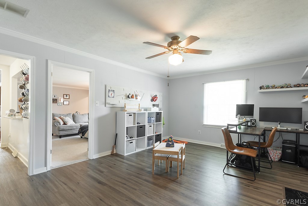 3825 Frankmont Road Richmond, VA 23234 - Photo 22 of 47 a living room with furniture and a wooden floor