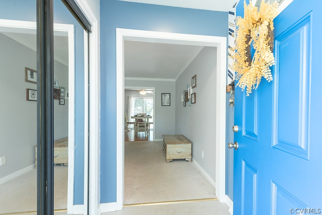 3825 Frankmont Road Richmond, VA 23234 - Photo 4 of 47 a view of a hallway with a livingroom and a dinning room