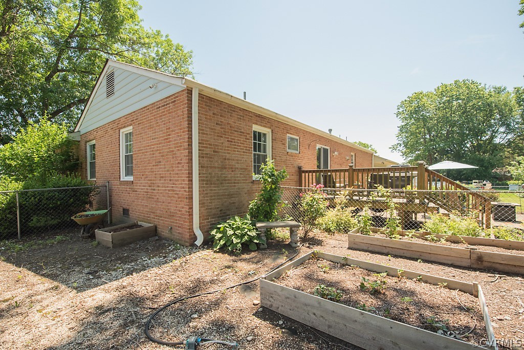 3825 Frankmont Road Richmond, VA 23234 - Photo 44 of 47 a front view of a house with garden