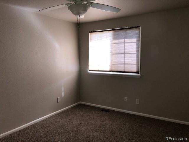19917 Mitchell Circle Denver, CO 80249 - Photo 9 of 13 an empty room with a window