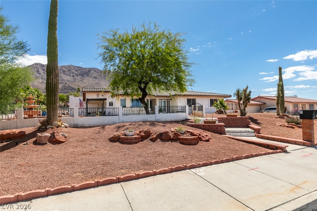 892 North Hollywood Boulevard Las Vegas, NV 89110 - Photo 64 of 81 This desert dwelling offers inviting curb appeal and a serene natural setting.