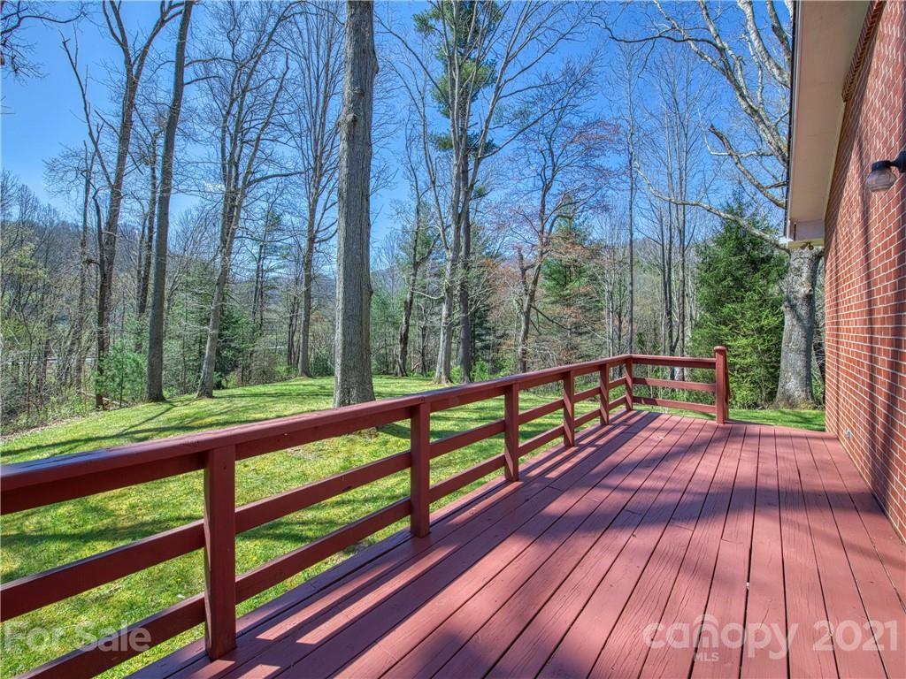720 Iron Duff Road Waynesville, NC 28785 - Photo 26 of 37 a view of two chairs in a balcony
