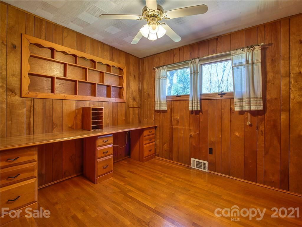 720 Iron Duff Road Waynesville, NC 28785 - Photo 28 of 37 a view of workspace with wooden floor and fan