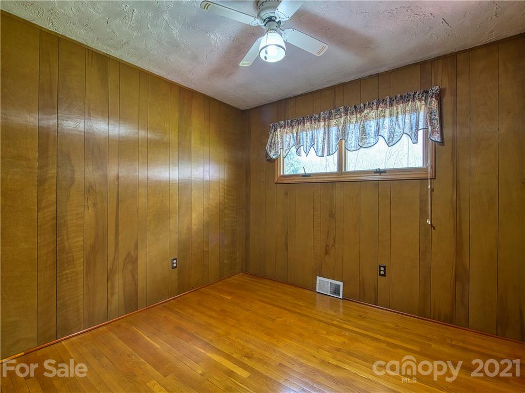 720 Iron Duff Road Waynesville, NC 28785 - Photo 33 of 37 a view of an empty room with a window