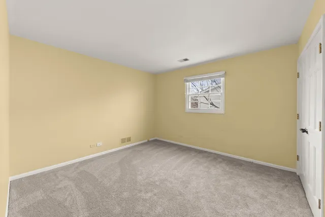 an empty room with a hallway