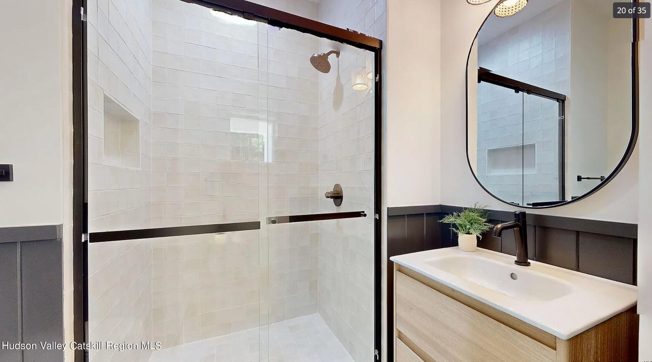 382 Beaverkill Road Olivebridge, NY 12461 - Photo 16 of 40 a bathroom with a sink and a mirror