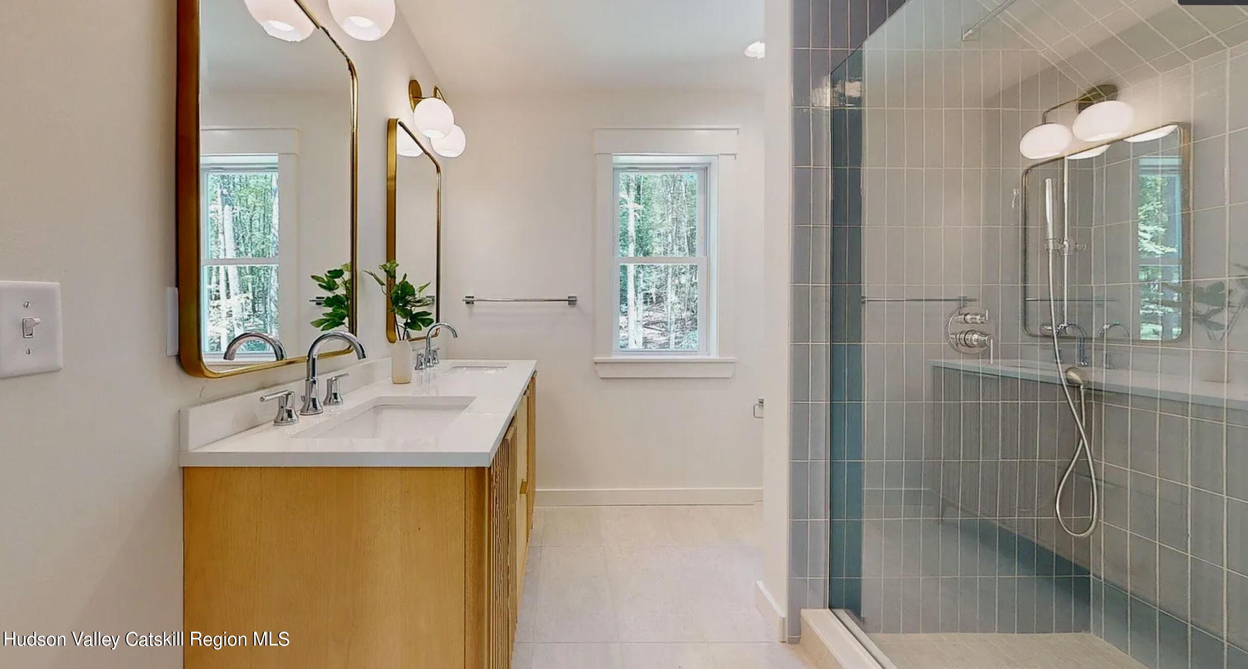 382 Beaverkill Road Olivebridge, NY 12461 - Photo 24 of 40 a bathroom with a granite countertop sink and a mirror