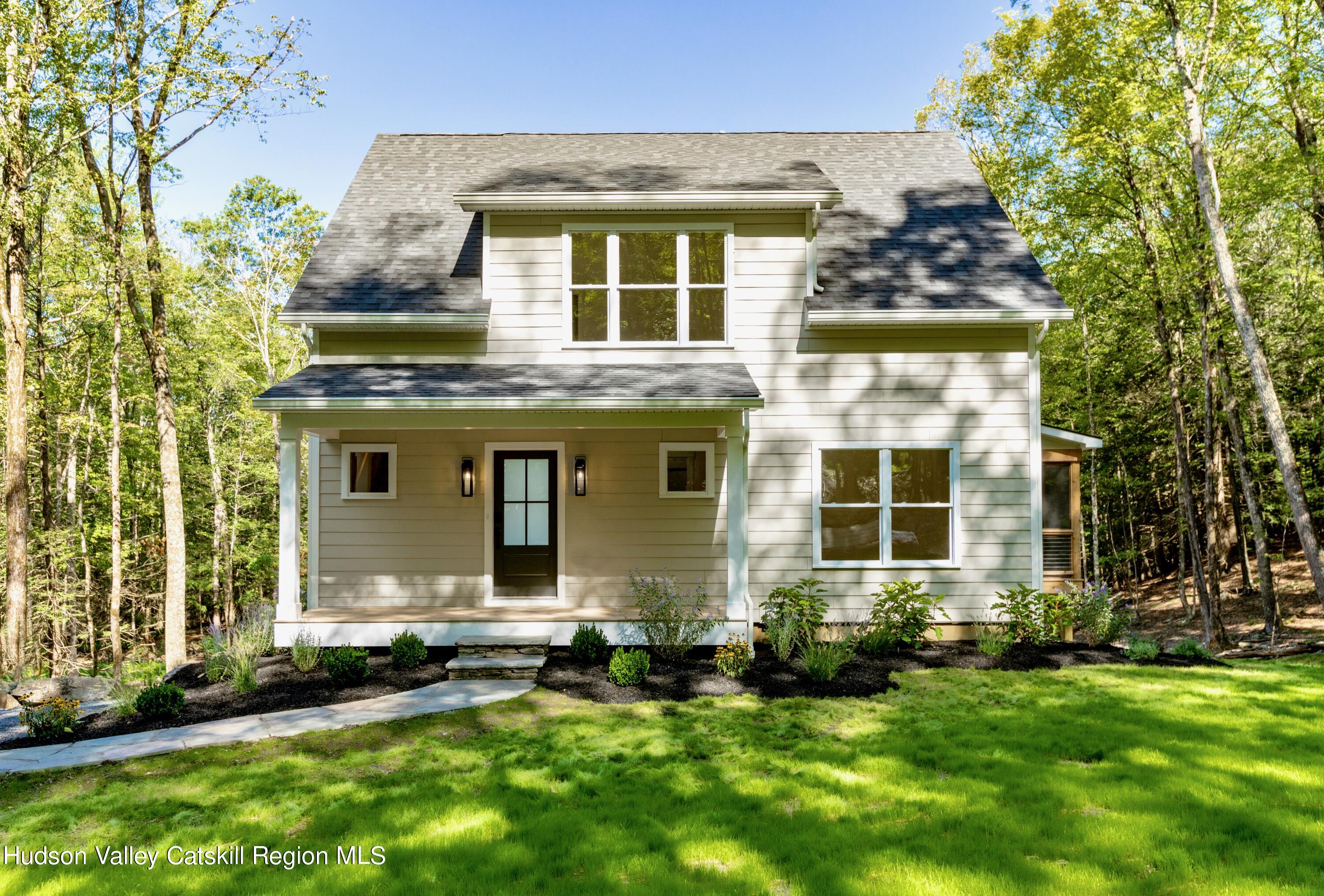 382 Beaverkill Road Olivebridge, NY 12461 - Photo 4 of 40 front view of a house with a yard