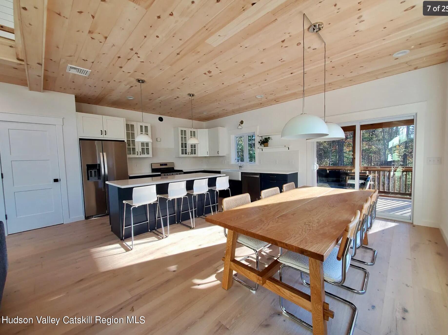382 Beaverkill Road Olivebridge, NY 12461 - Photo 9 of 40 a open kitchen with a table and chairs in it