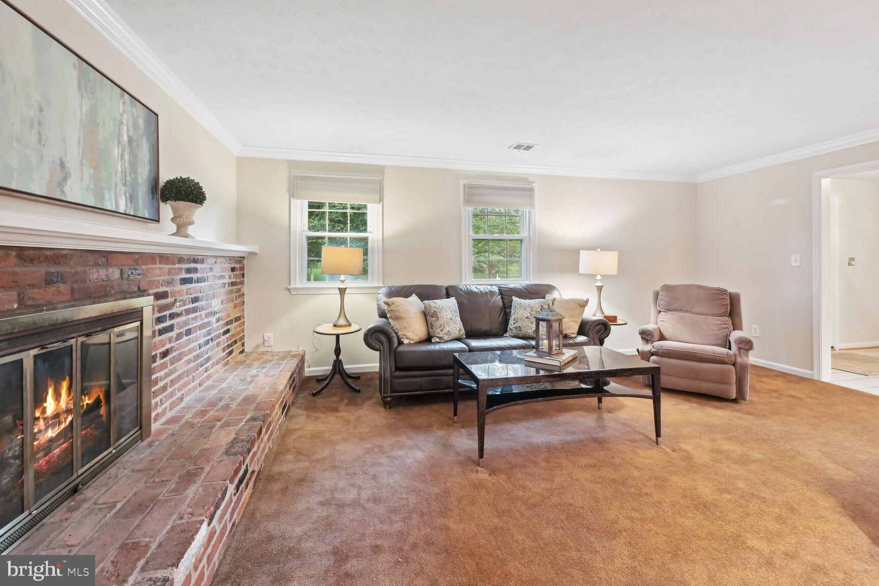 7413 Miller Fall Road Rockville, MD 20855 - Photo 29 of 63 Family room with gas fireplace