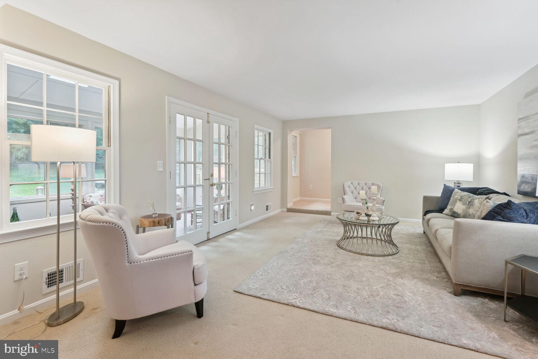 7413 Miller Fall Road Rockville, MD 20855 - Photo 5 of 63 Living room with french door to sunroom