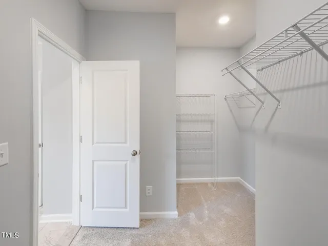 a view of a room with racks on the wall