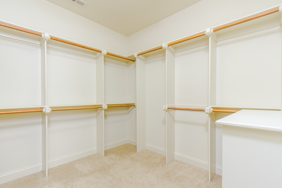9316 Tabriz Point Raleigh, NC 27614 - Photo 19 of 25 Walk in master closet complete with custom shelving. Master Closet