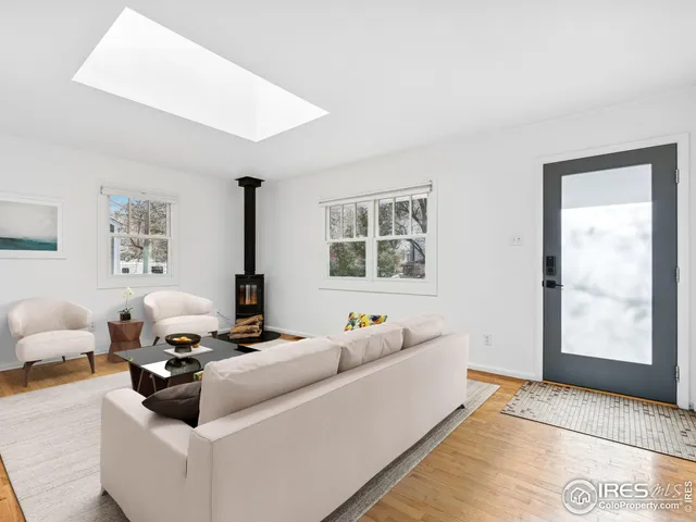 a living room with furniture and window