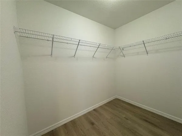a view of a room with racks on the wall