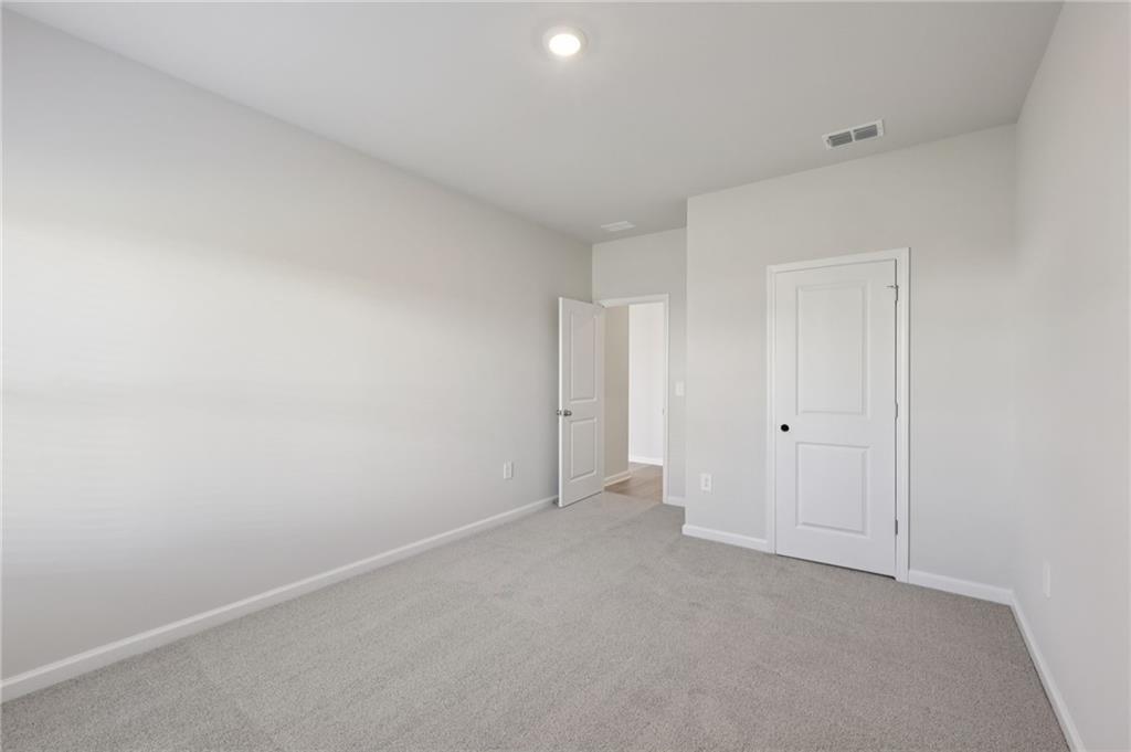 1489 High Fls Lane Grayson, GA 30017 - Photo 21 of 44 a view of an empty room