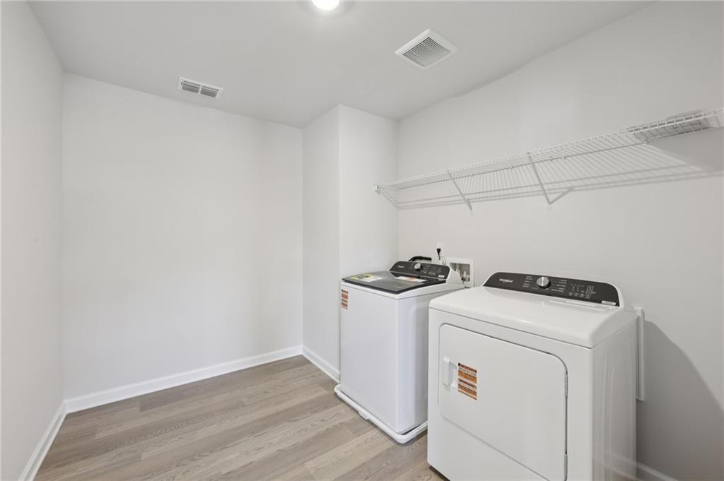 1489 High Fls Lane Grayson, GA 30017 - Photo 31 of 44 a utility room with dryer and washer