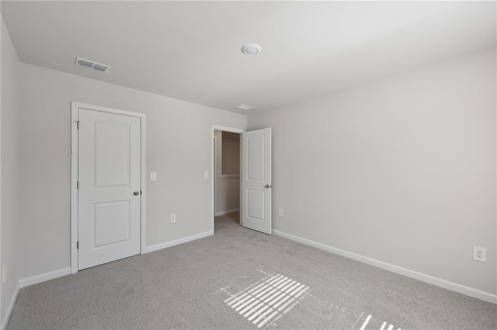 1489 High Fls Lane Grayson, GA 30017 - Photo 38 of 44 a view of an empty room