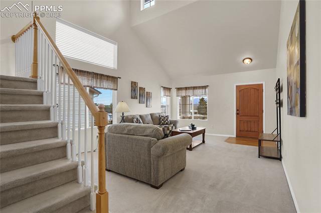 345 Talus Road Monument, CO 80132 - Photo 4 of 6 The Living Room Can Also Be Used as a Formal Dining Room/Living Room Combo
