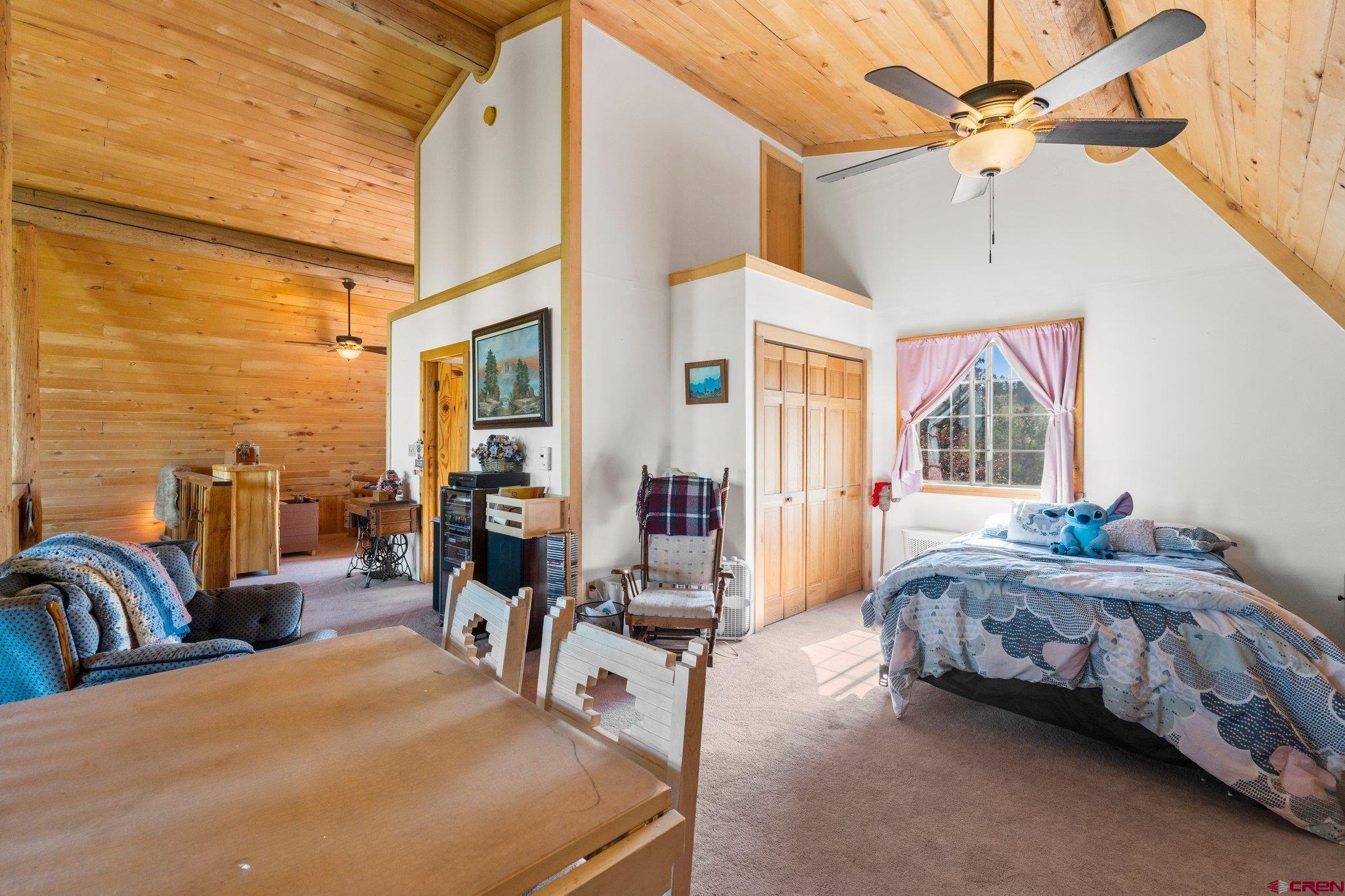 3515 County Road 514 Ignacio, CO 81137 - Photo 22 of 35 a bedroom with double bed and a window