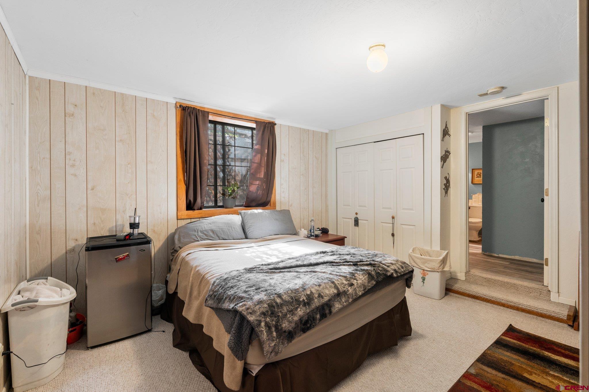 3515 County Road 514 Ignacio, CO 81137 - Photo 24 of 35 a bedroom with a bed and a window