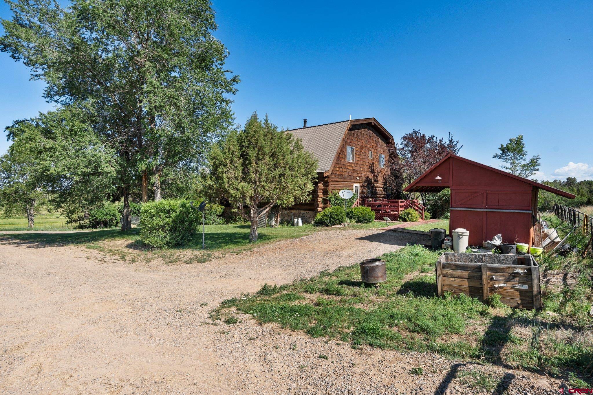3515 County Road 514 Ignacio, CO 81137 - Photo 3 of 35 a front view of a house with a yard