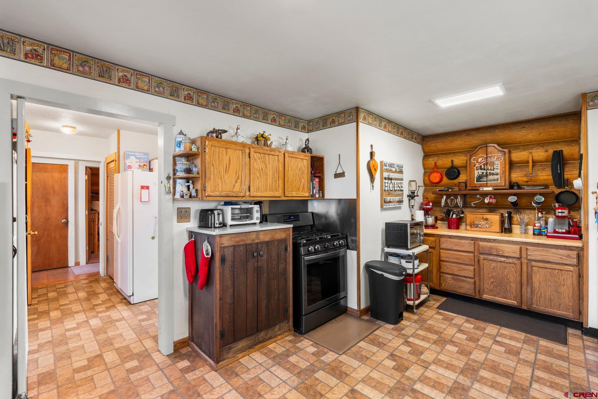 3515 County Road 514 Ignacio, CO 81137 - Photo 33 of 35 a kitchen with stainless steel appliances granite countertop a refrigerator and a stove
