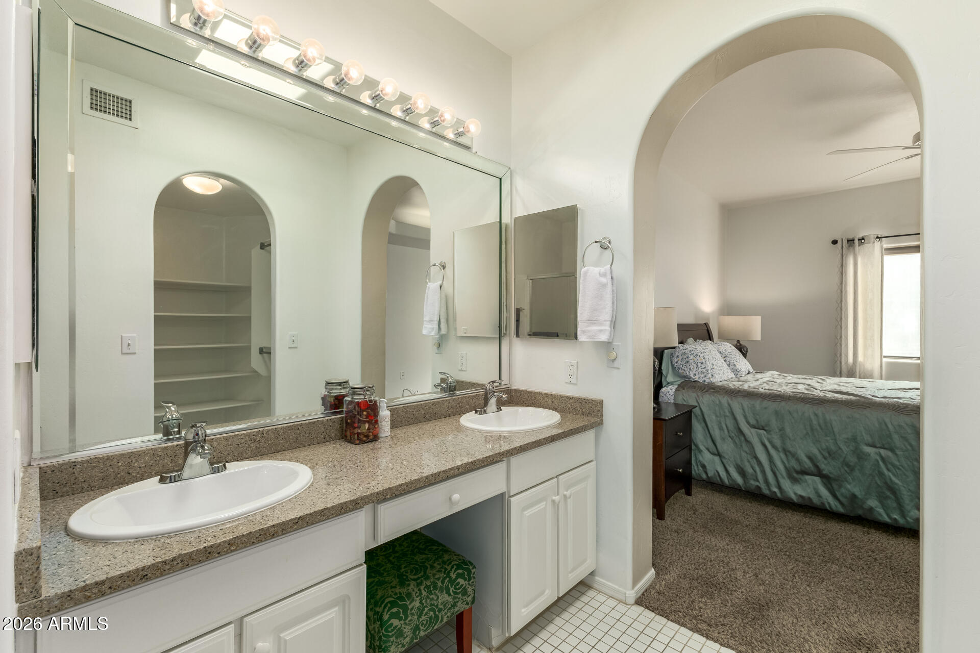 5445 East McKellips Road, Unit 23 Mesa, AZ 85215 - Photo 15 of 32 a bathroom with double vanity sinks and a mirror