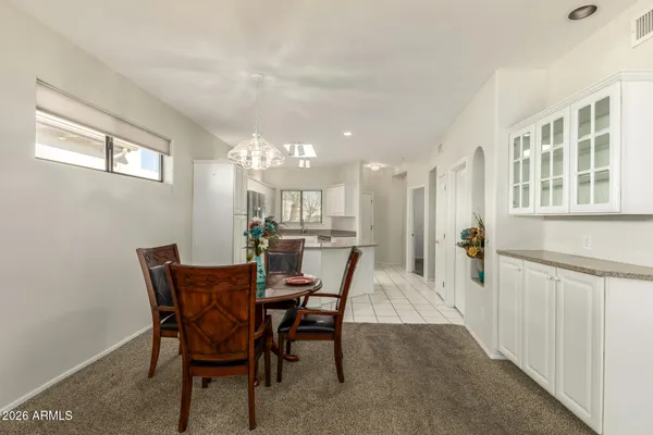 a view of a dining room with furniture