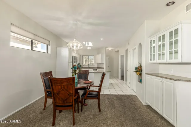 a view of a dining room with furniture
