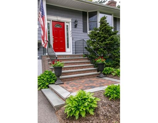 111 Sutton Road Needham, MA 02492 - Photo 1 of 30 a view of a house with potted plants