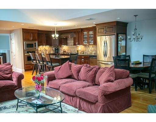 111 Sutton Road Needham, MA 02492 - Photo 11 of 30 a living room with furniture and a large window