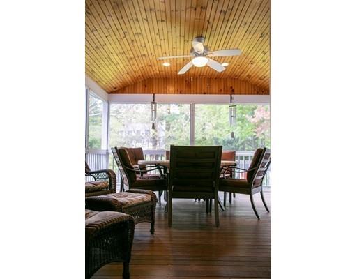 111 Sutton Road Needham, MA 02492 - Photo 15 of 30 a dining room with furniture and wooden floor