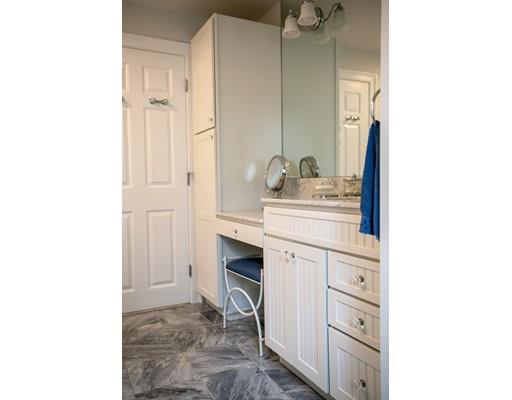 111 Sutton Road Needham, MA 02492 - Photo 21 of 30 a bathroom with a sink vanity and mirror