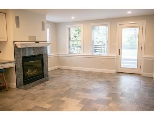 111 Sutton Road Needham, MA 02492 - Photo 27 of 30 a view of empty room with fireplace and window