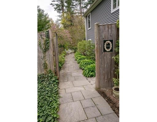 111 Sutton Road Needham, MA 02492 - Photo 30 of 30 a pathway of a house with potted plants