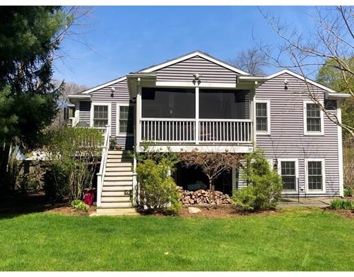111 Sutton Road Needham, MA 02492 - Photo 3 of 30 a front view of a house with a yard
