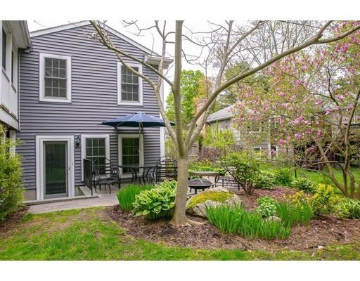 111 Sutton Road Needham, MA 02492 - Photo 5 of 30 a view of a house with a yard and plants